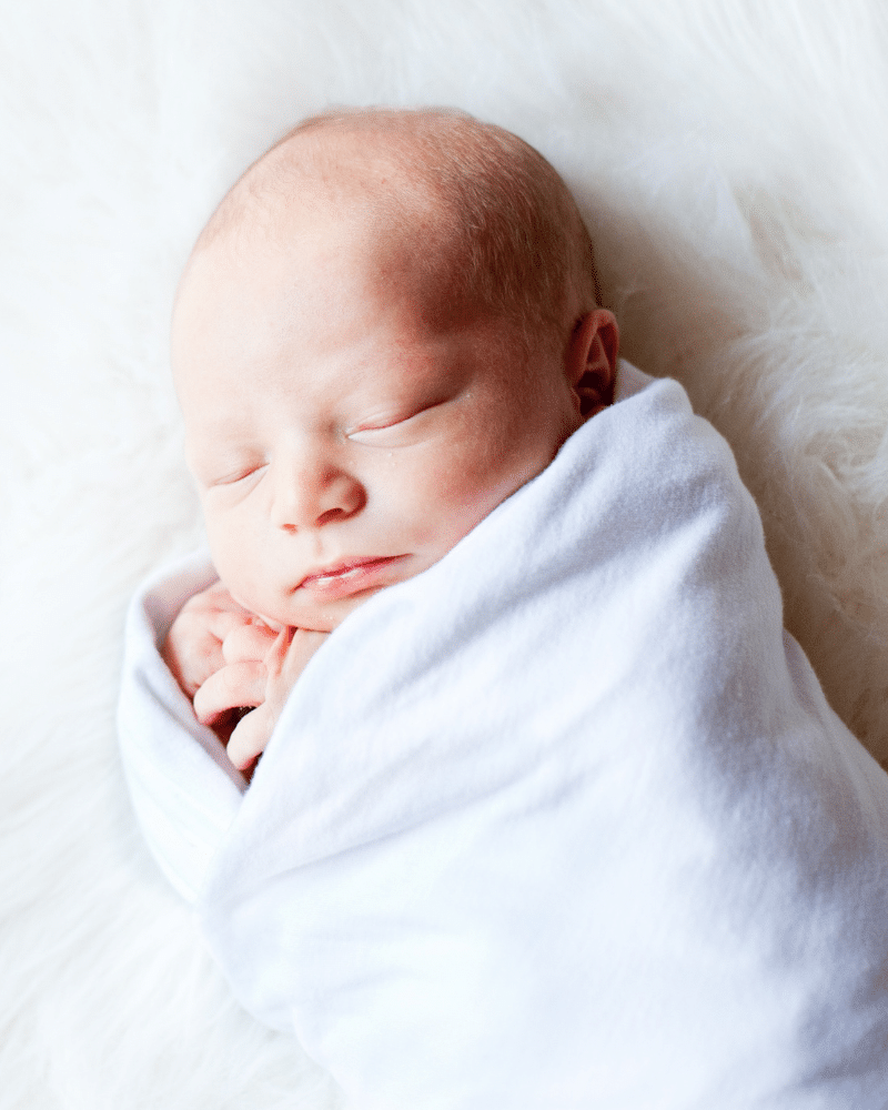 How long should a newborn sleep without feeding